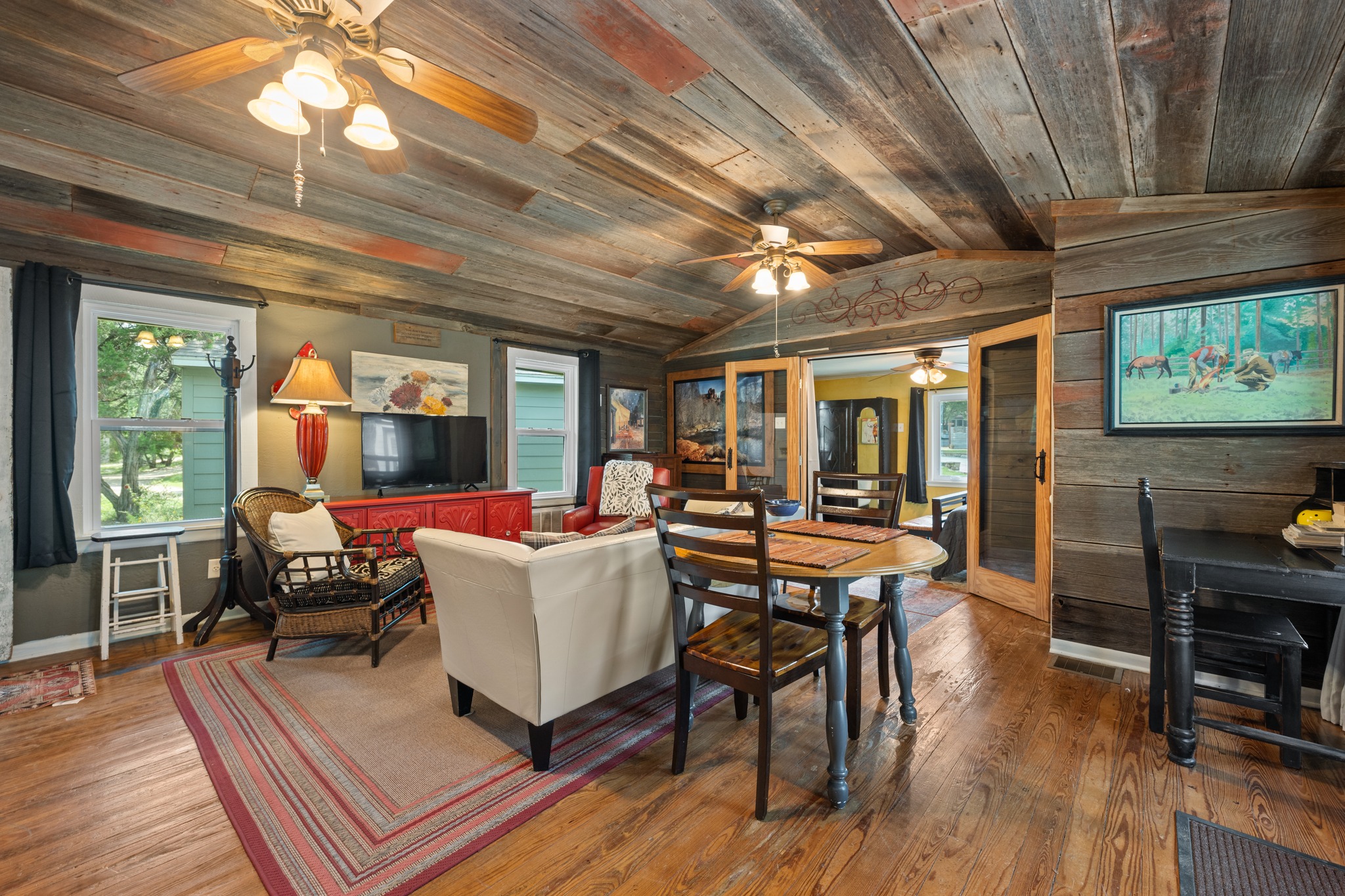 12932 Nutty Brown Road Austin, TX 78737 - Photo 17 of 40 The Cabin - Open-concept living and kitchen spaces create a cozy gathering place.