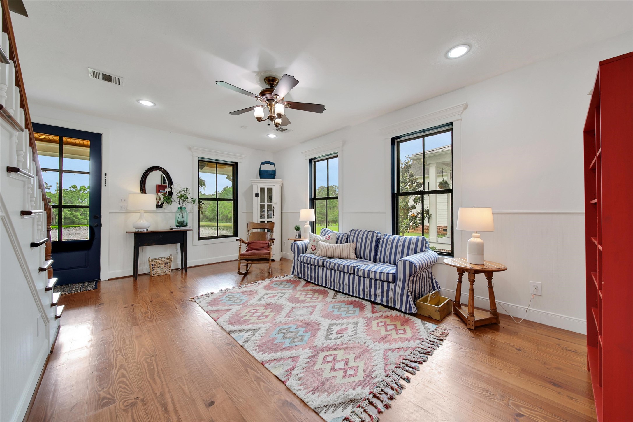 18875 Rabon Chapel Road Montgomery, TX 77316 - Photo 26 of 45 a living room with furniture and wooden floor