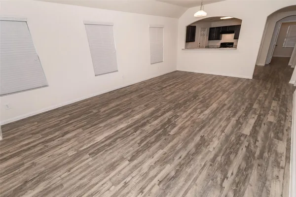 a view of a livingroom with wooden floor