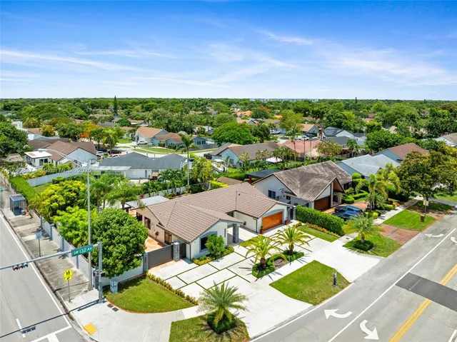 an aerial view of a house with garden