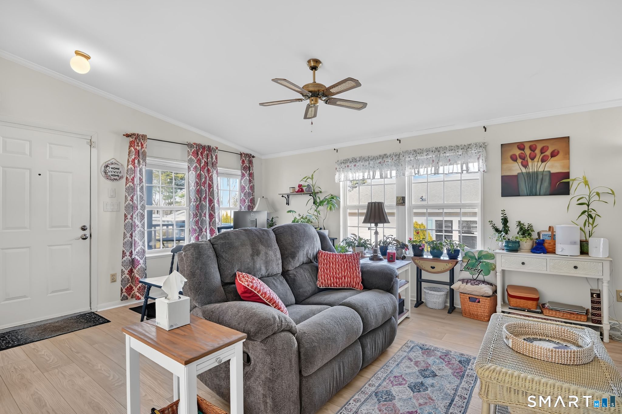 7 Eastview Road Southington, CT 06489 - Photo 12 of 36 a living room with furniture and a large window