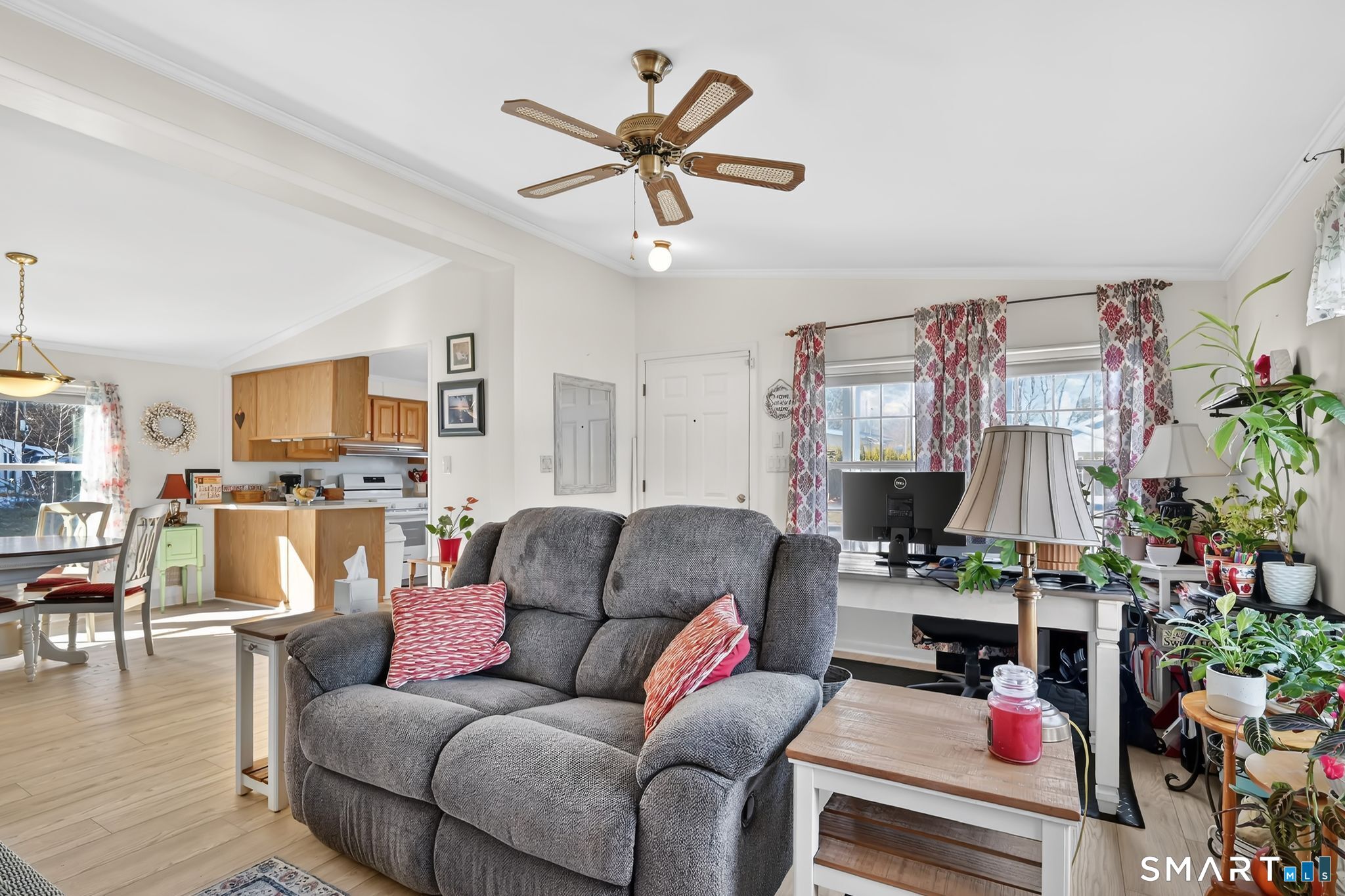 7 Eastview Road Southington, CT 06489 - Photo 13 of 36 a living room with furniture and a flat screen tv