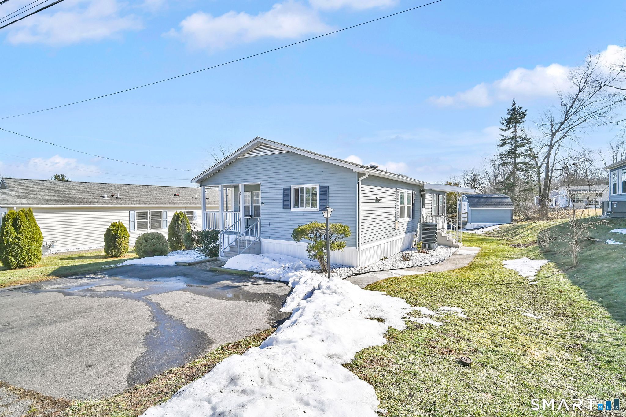 7 Eastview Road Southington, CT 06489 - Photo 3 of 36 a view of a house with backyard and sitting area