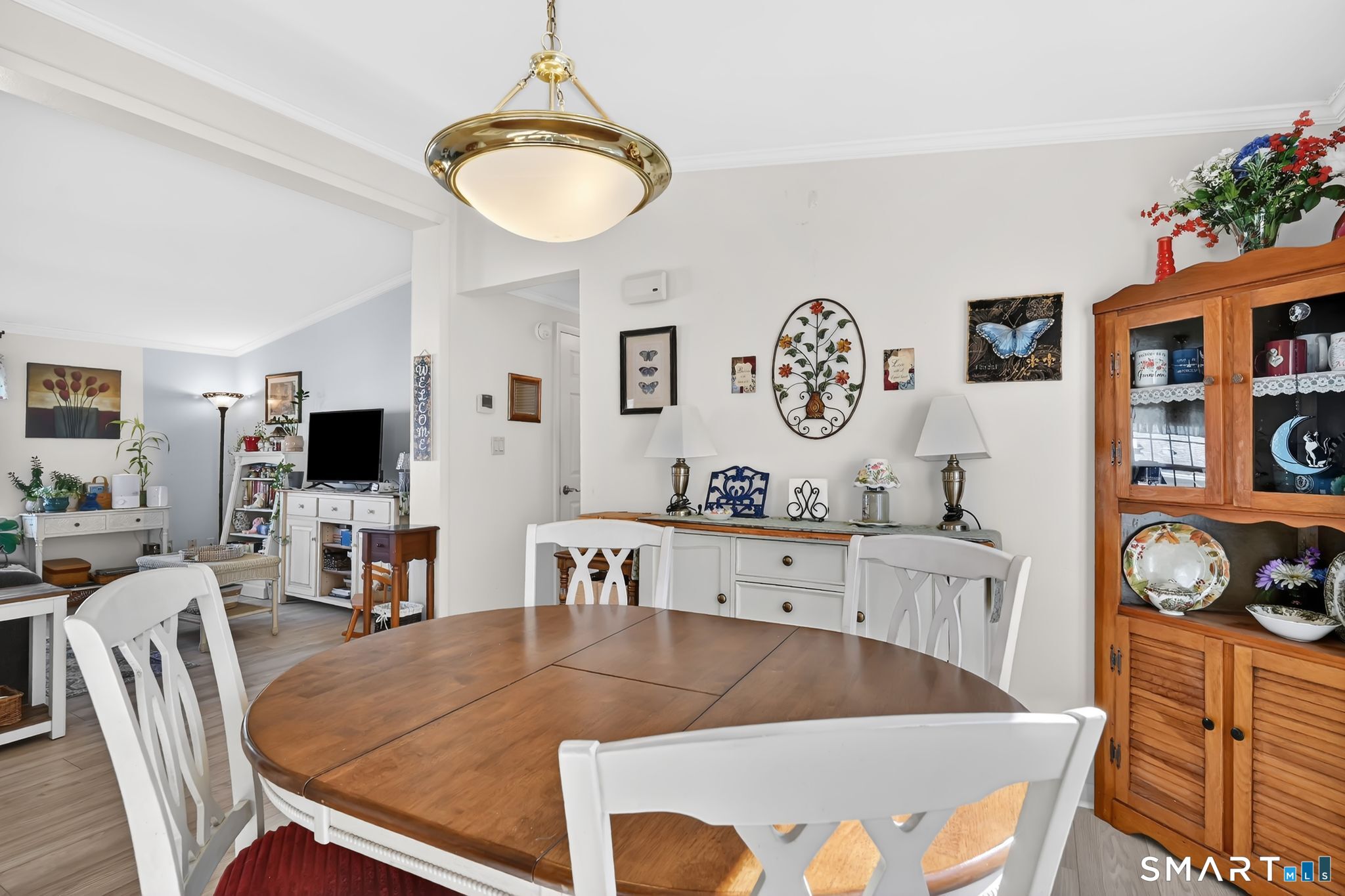 7 Eastview Road Southington, CT 06489 - Photo 10 of 36 a living room with furniture and a flat screen tv