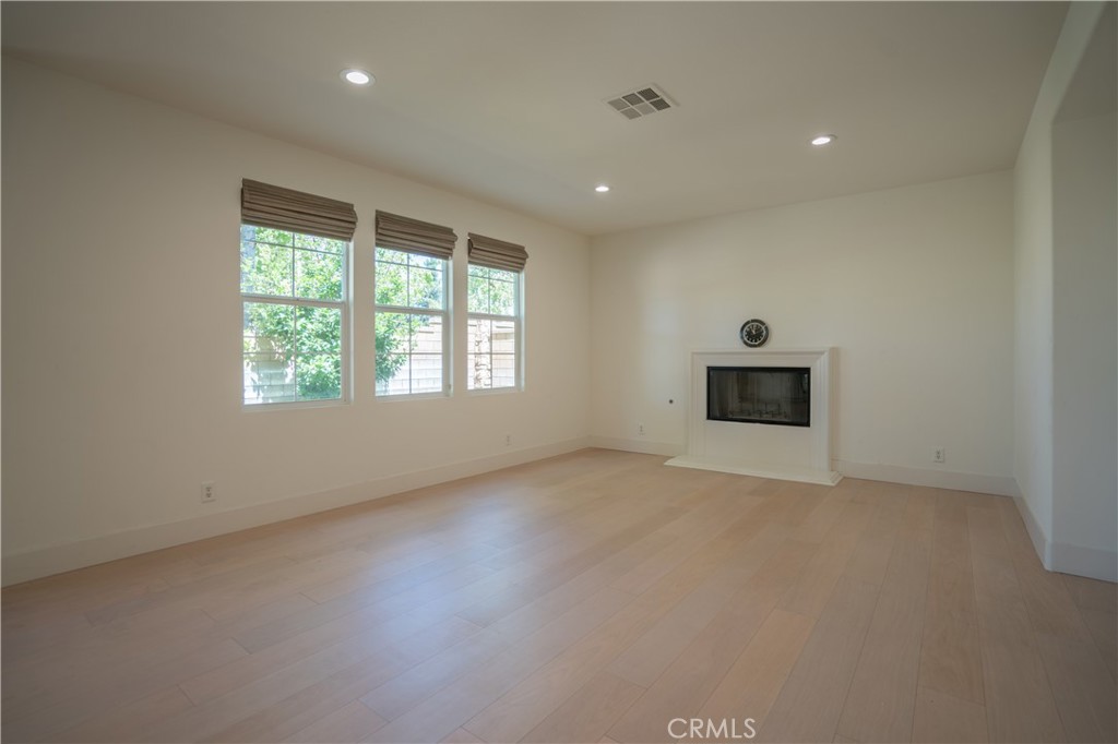 8656 Harvest Place Rancho Cucamonga, CA 91730 - Photo 13 of 39 an empty room with windows