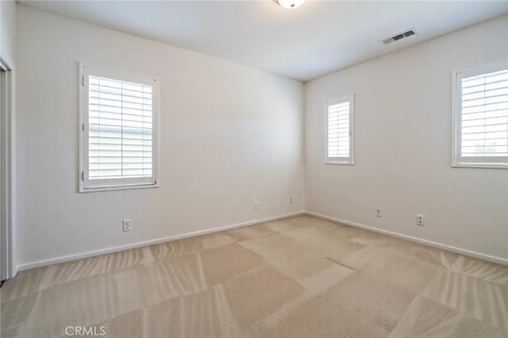 8656 Harvest Place Rancho Cucamonga, CA 91730 - Photo 22 of 39 an empty room with a window