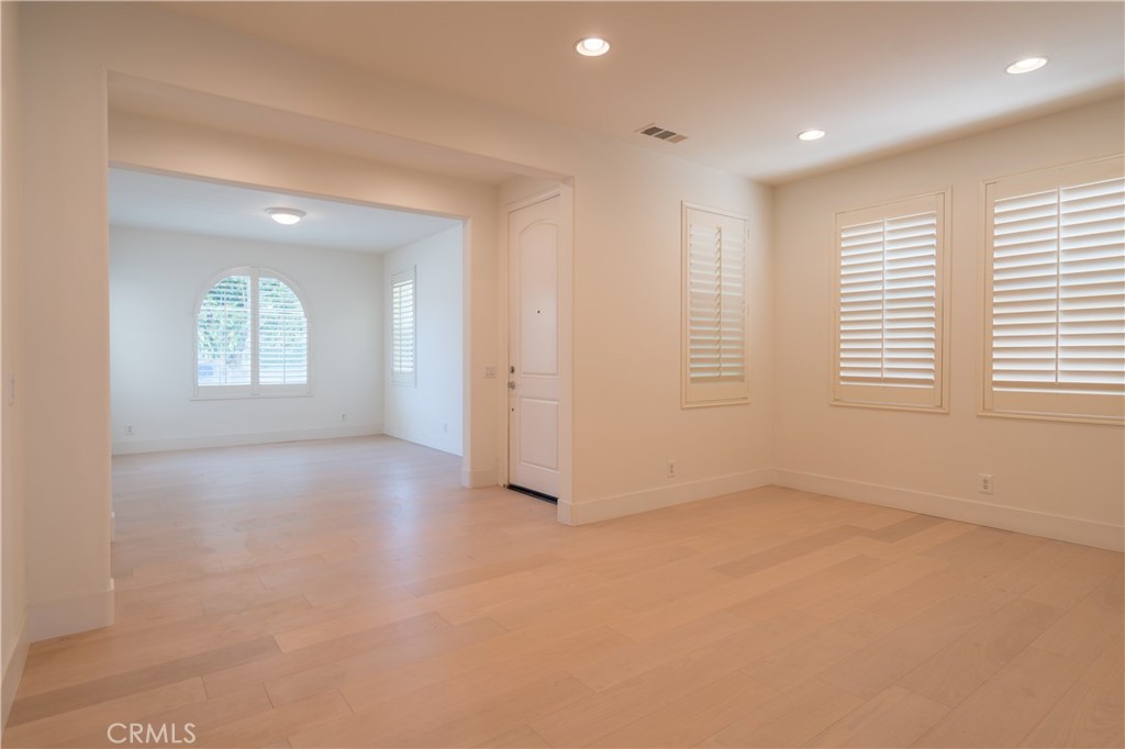 8656 Harvest Place Rancho Cucamonga, CA 91730 - Photo 3 of 39 an empty room with windows and closet