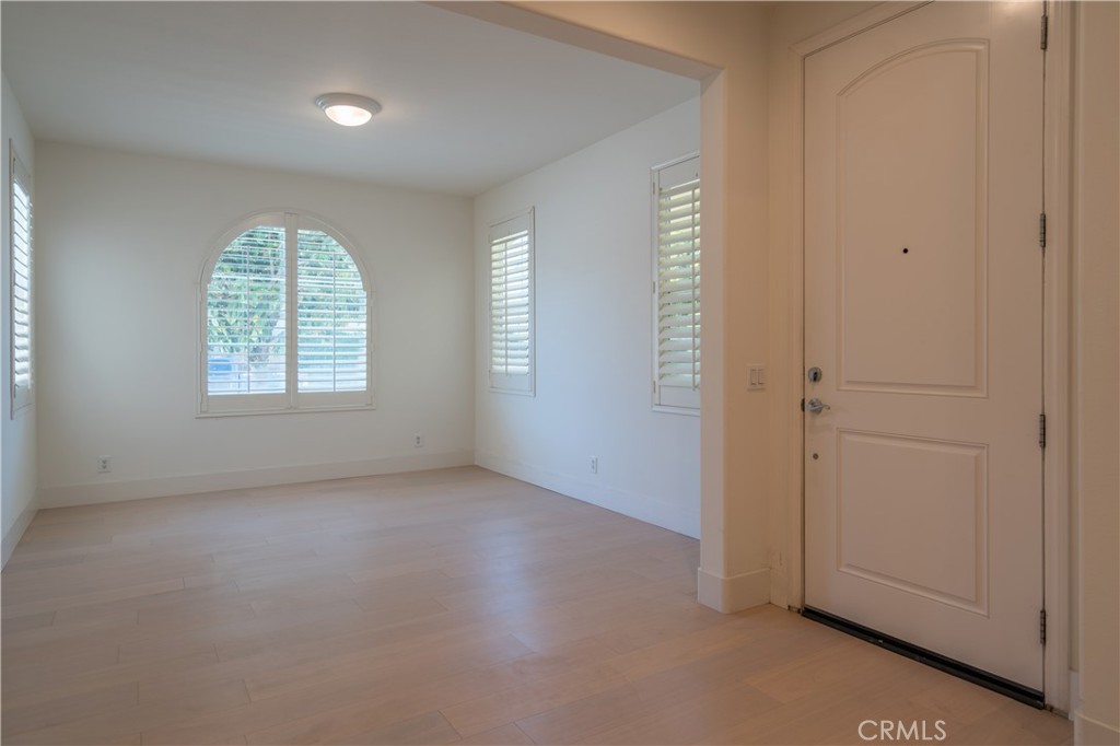 8656 Harvest Place Rancho Cucamonga, CA 91730 - Photo 5 of 39 an empty room with windows and closet