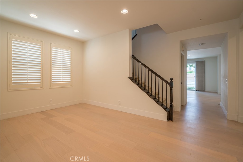 8656 Harvest Place Rancho Cucamonga, CA 91730 - Photo 6 of 39 a view of a hallway with a window