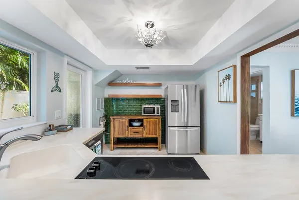 a room with a bed and a sink