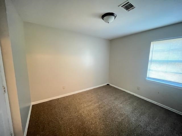 338 West Holmes Road Memphis, TN 38109 - Photo 2 of 11 an empty room with a window
