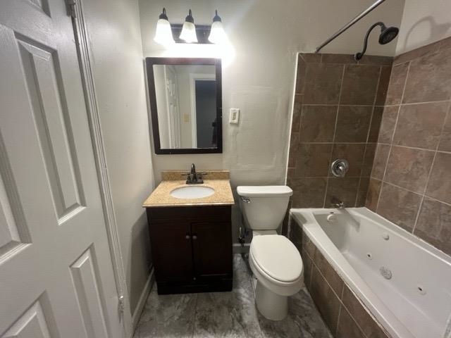 338 West Holmes Road Memphis, TN 38109 - Photo 3 of 11 a bathroom with a sink toilet and shower