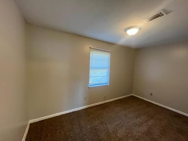 338 West Holmes Road Memphis, TN 38109 - Photo 10 of 11 an empty room with a window