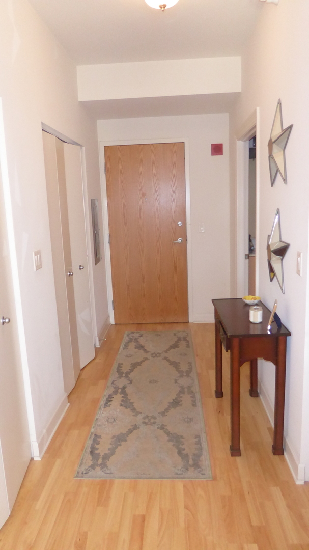 451 West Huron Street, Unit 709 Chicago, IL 60654 - Photo 14 of 19 a view of an empty room
