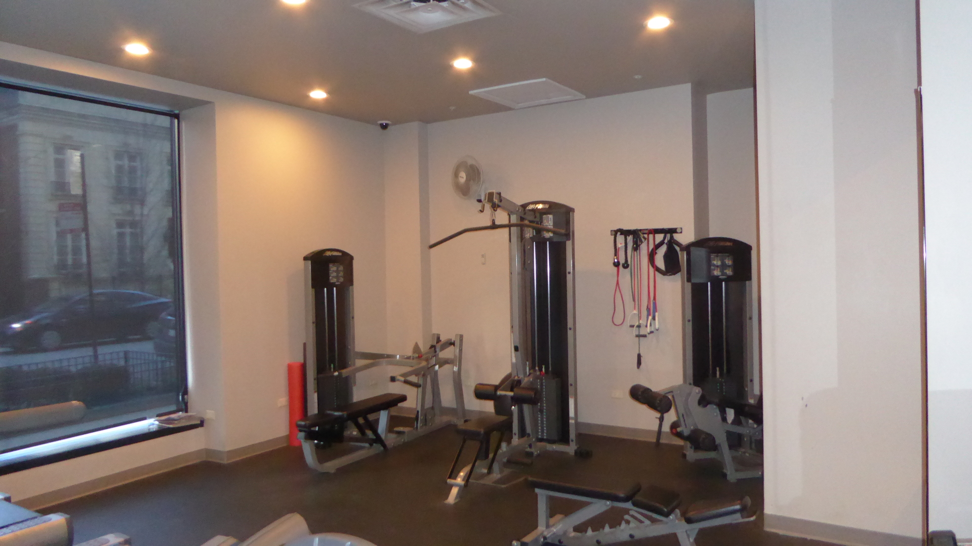 451 West Huron Street, Unit 709 Chicago, IL 60654 - Photo 18 of 19 a view of a room with gym equipment