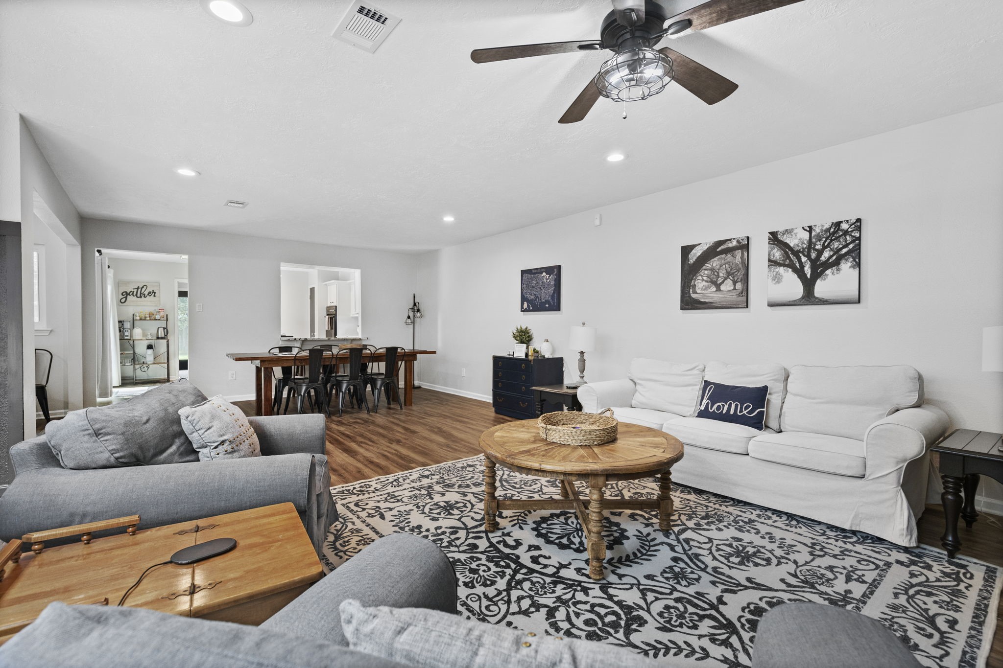 623 Hickory Ridge Drive Shenandoah, TX 77381 - Photo 12 of 26 a living room with furniture and view of kitchen