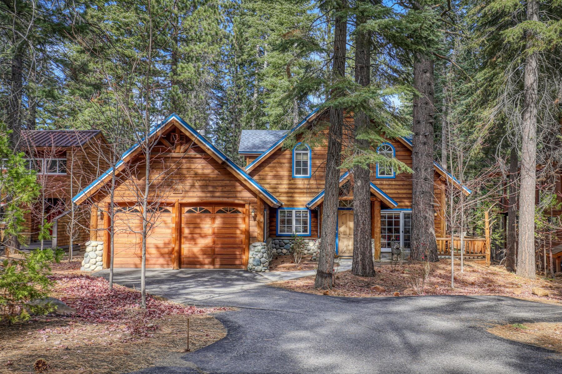 850 Beaver Pond Truckee, CA 96161 - Photo 1 of 21 a front view of a house with garden