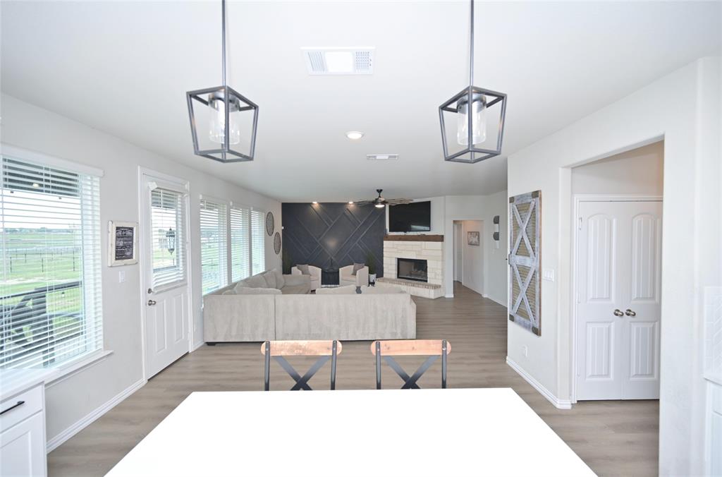 116 Spanish Moss Trail Rhome, TX 76078 - Photo 17 of 40 Kitchen facing Dining & Living
