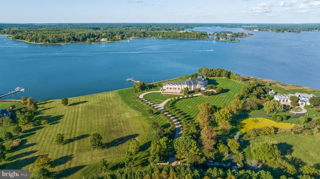 a view of a lake with a big yard