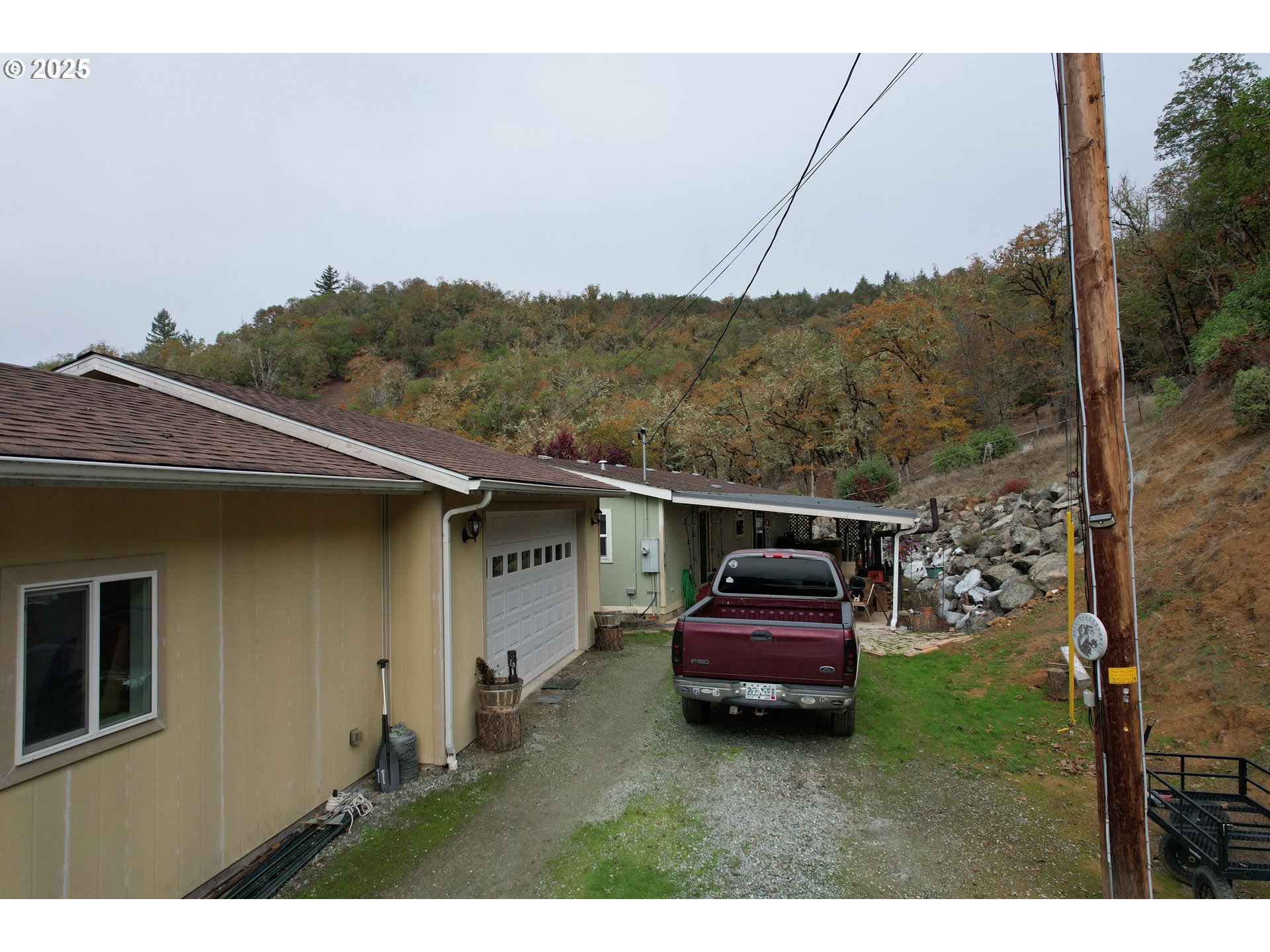 1320 Shoestring Road Riddle, OR 97469 - Photo 20 of 48 a car parked in front of a house