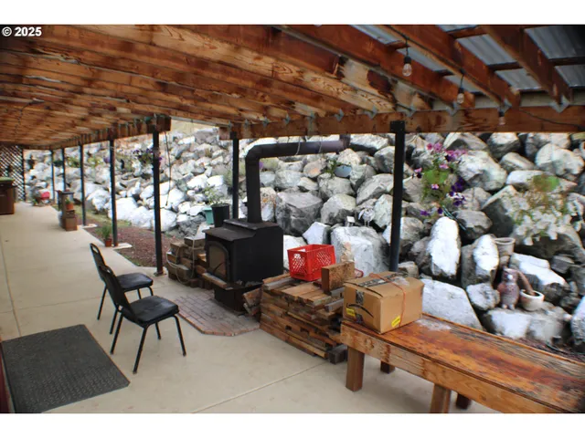 a room with lots of furniture and clutter