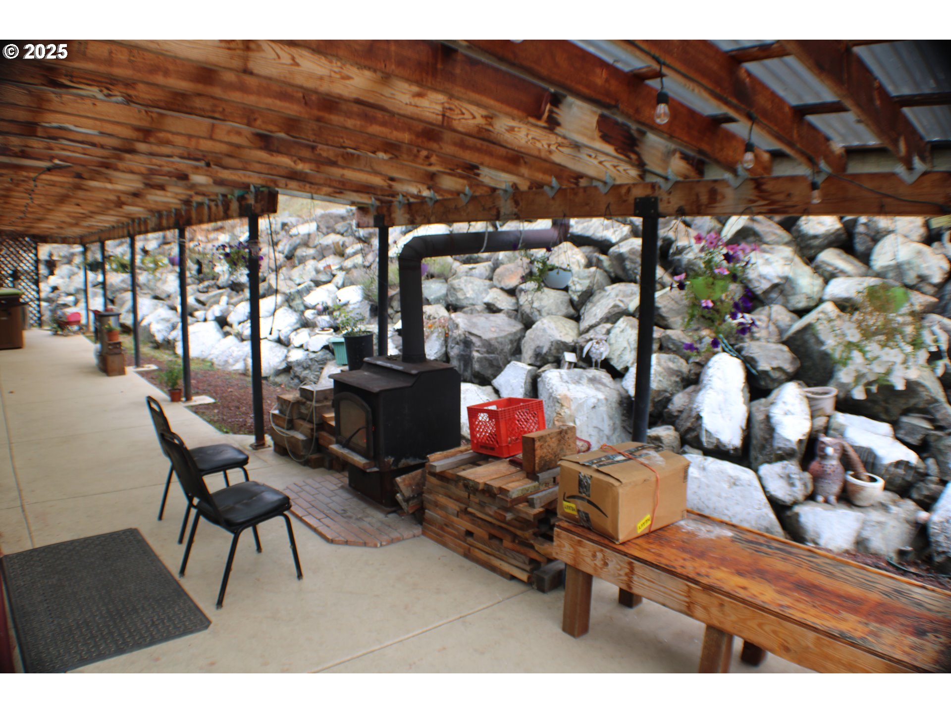 1320 Shoestring Road Riddle, OR 97469 - Photo 25 of 48 a room with lots of furniture and clutter