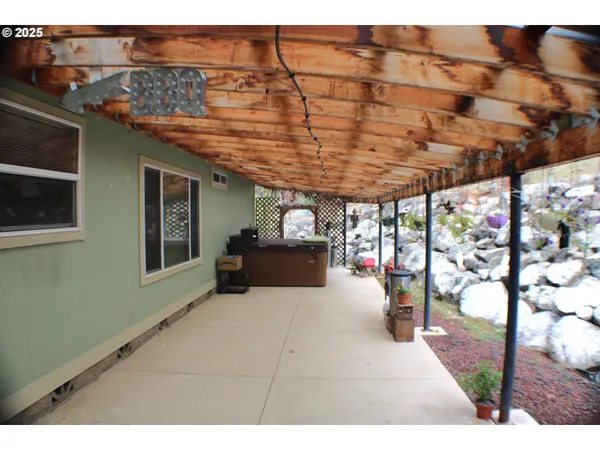 a view of a porch with furniture