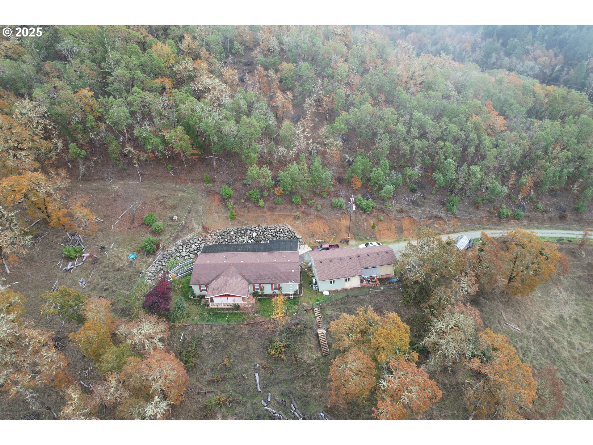 1320 Shoestring Road Riddle, OR 97469 - Photo 32 of 48 a view of a lake with a yard