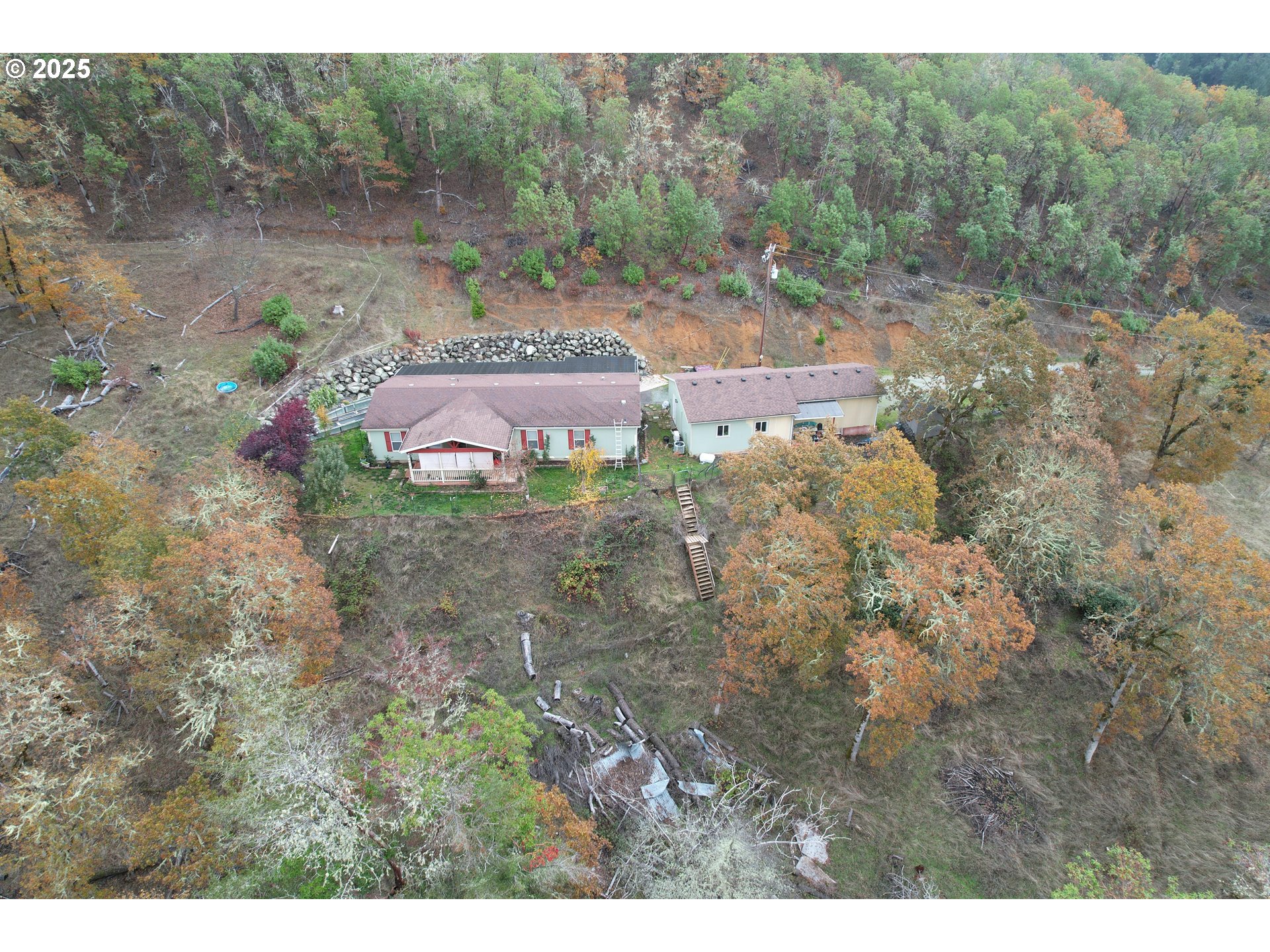 1320 Shoestring Road Riddle, OR 97469 - Photo 33 of 48 a backyard of a house with lots of green space