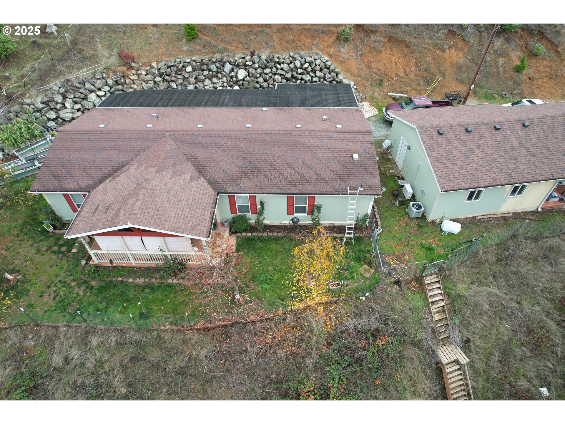 1320 Shoestring Road Riddle, OR 97469 - Photo 4 of 48 a aerial view of a house with a yard and lake view