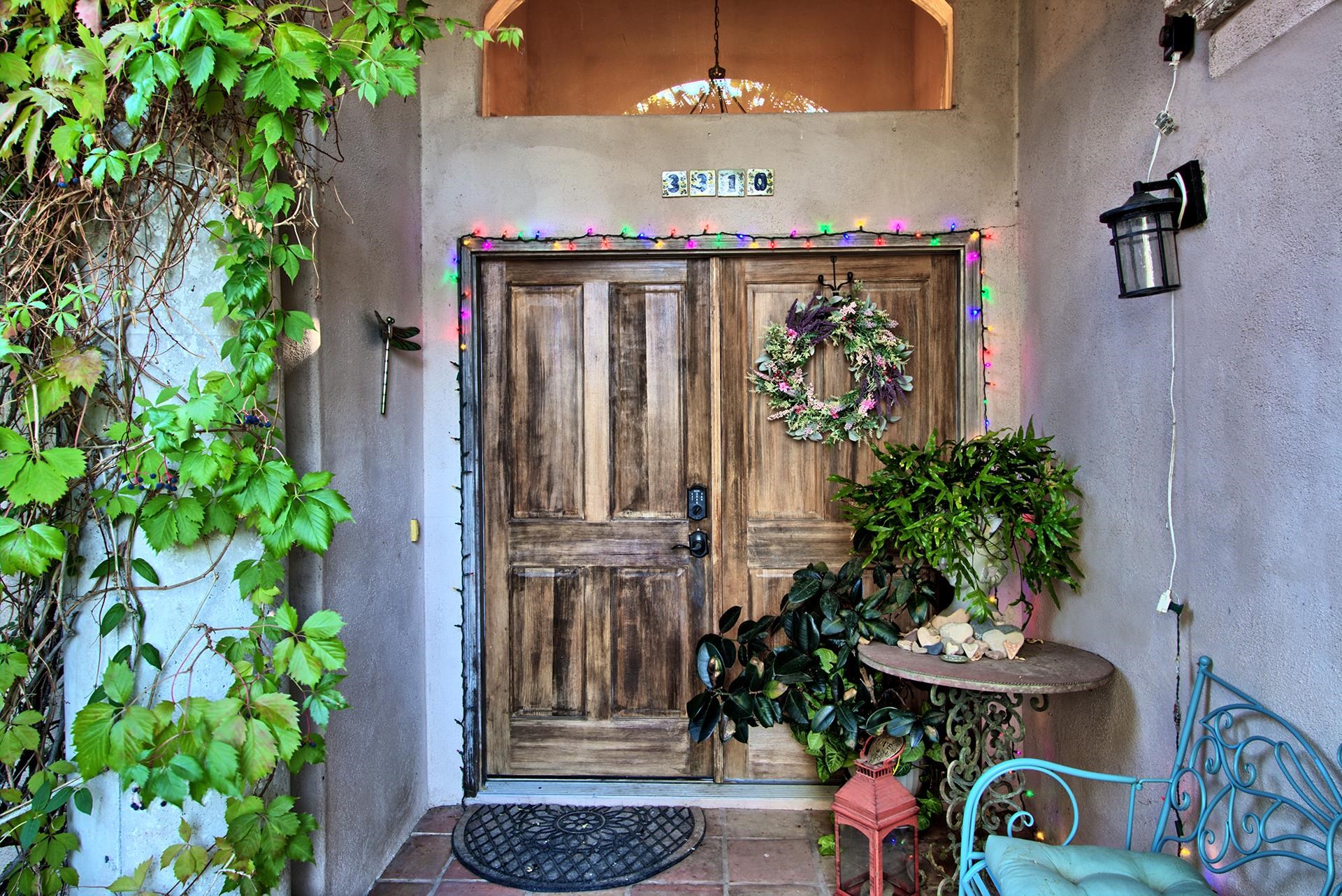 3310 C Road Palisade, CO 81526 - Photo 15 of 41 a front view of a house with entryway