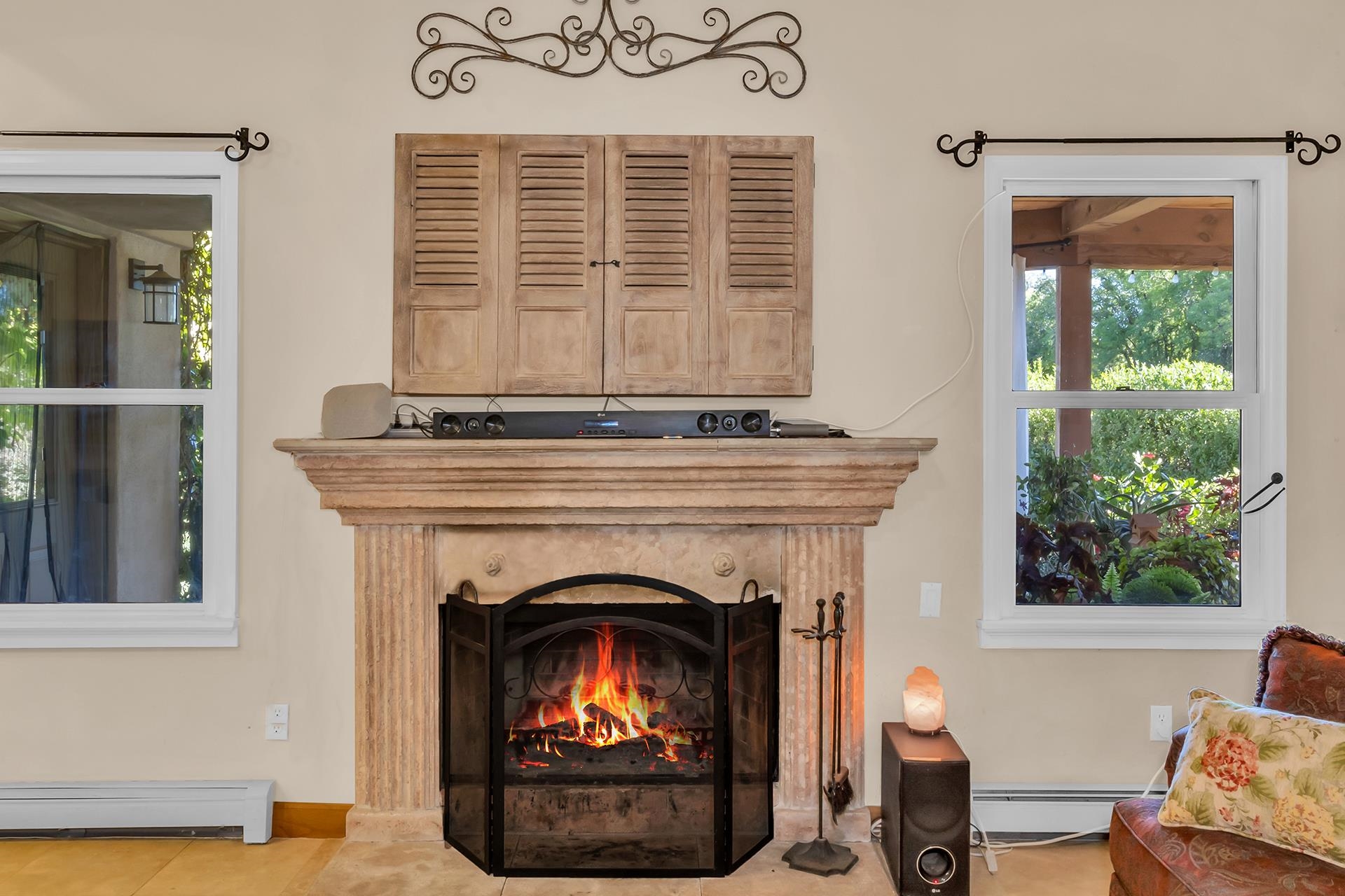 3310 C Road Palisade, CO 81526 - Photo 19 of 41 a living room with a fireplace and a window
