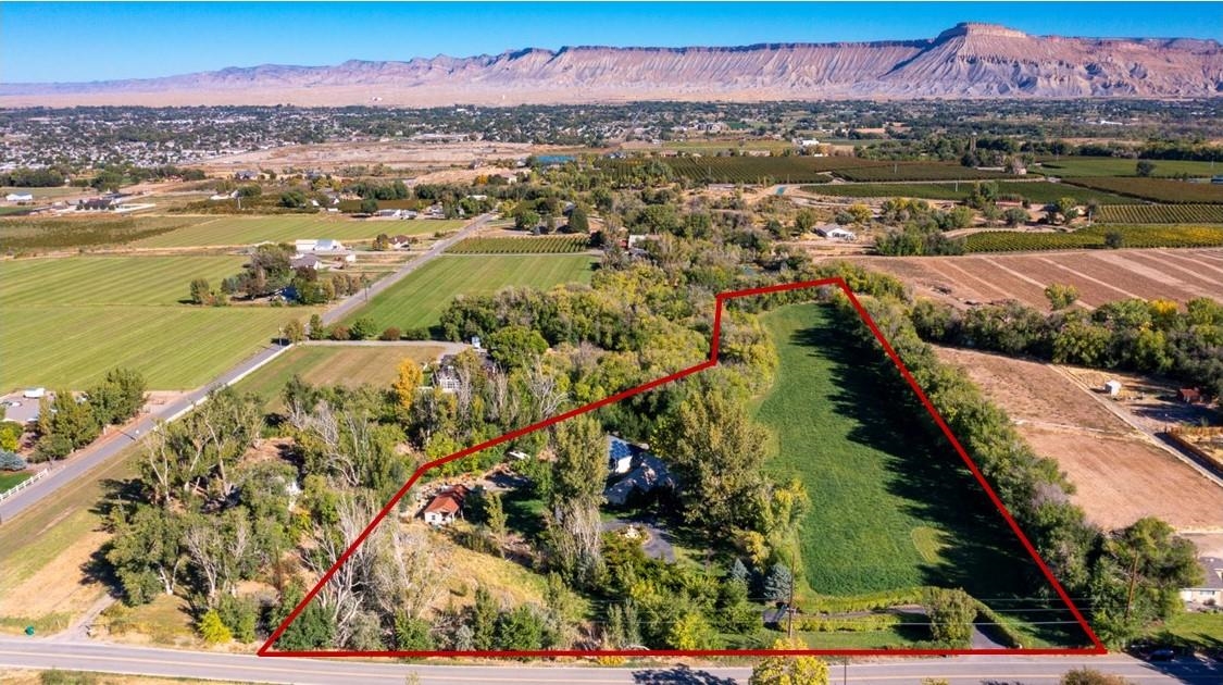 3310 C Road Palisade, CO 81526 - Photo 2 of 41 a view of a city with an ocean view