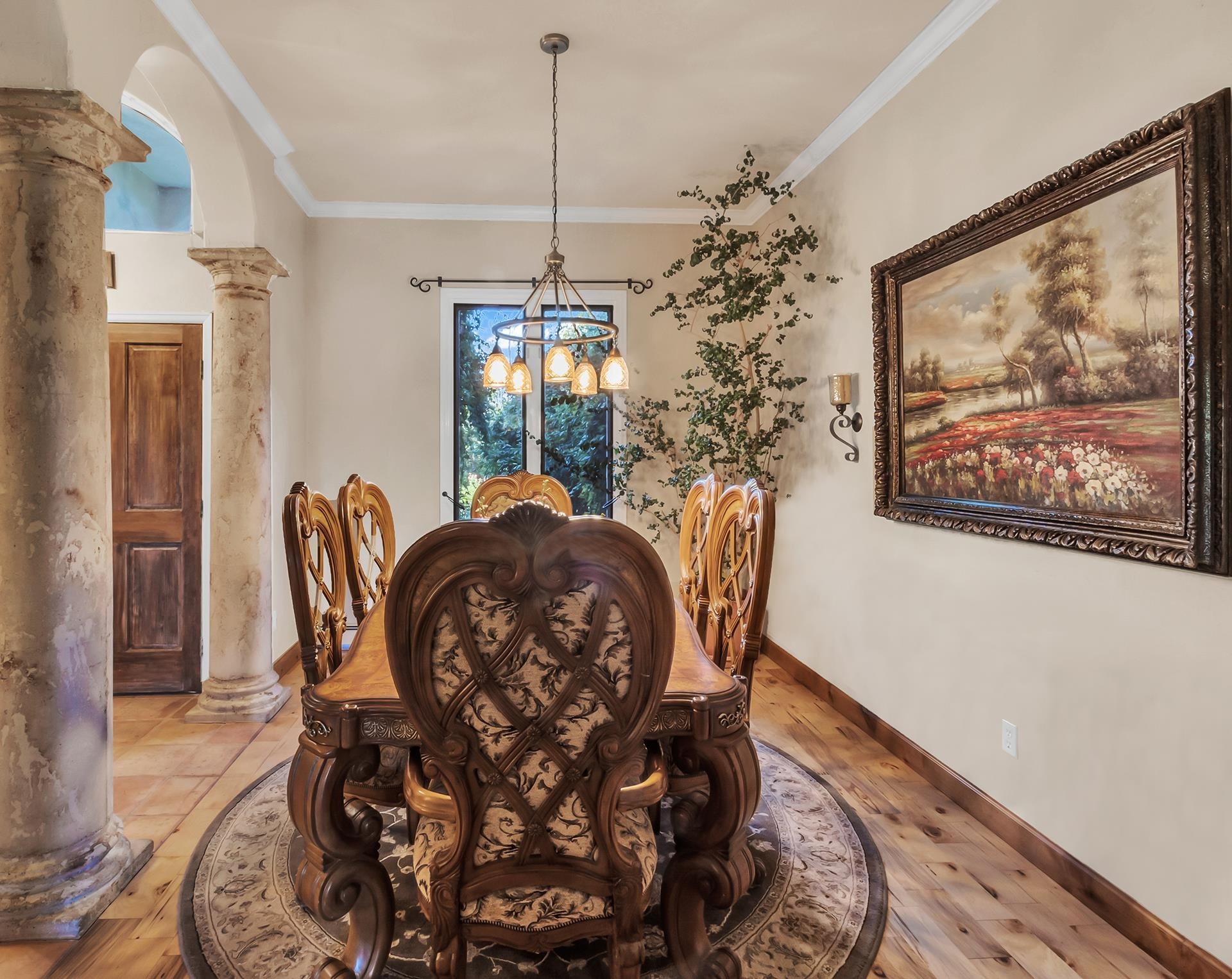 3310 C Road Palisade, CO 81526 - Photo 25 of 41 a view of a dining room with furniture window and wooden floor