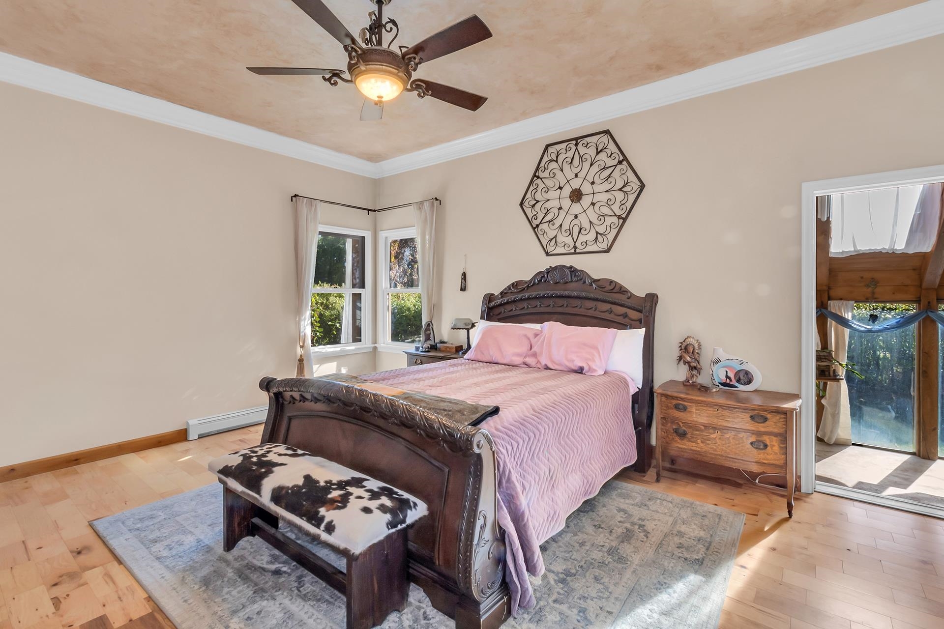 3310 C Road Palisade, CO 81526 - Photo 26 of 41 a bedroom with a bed dresser and a window