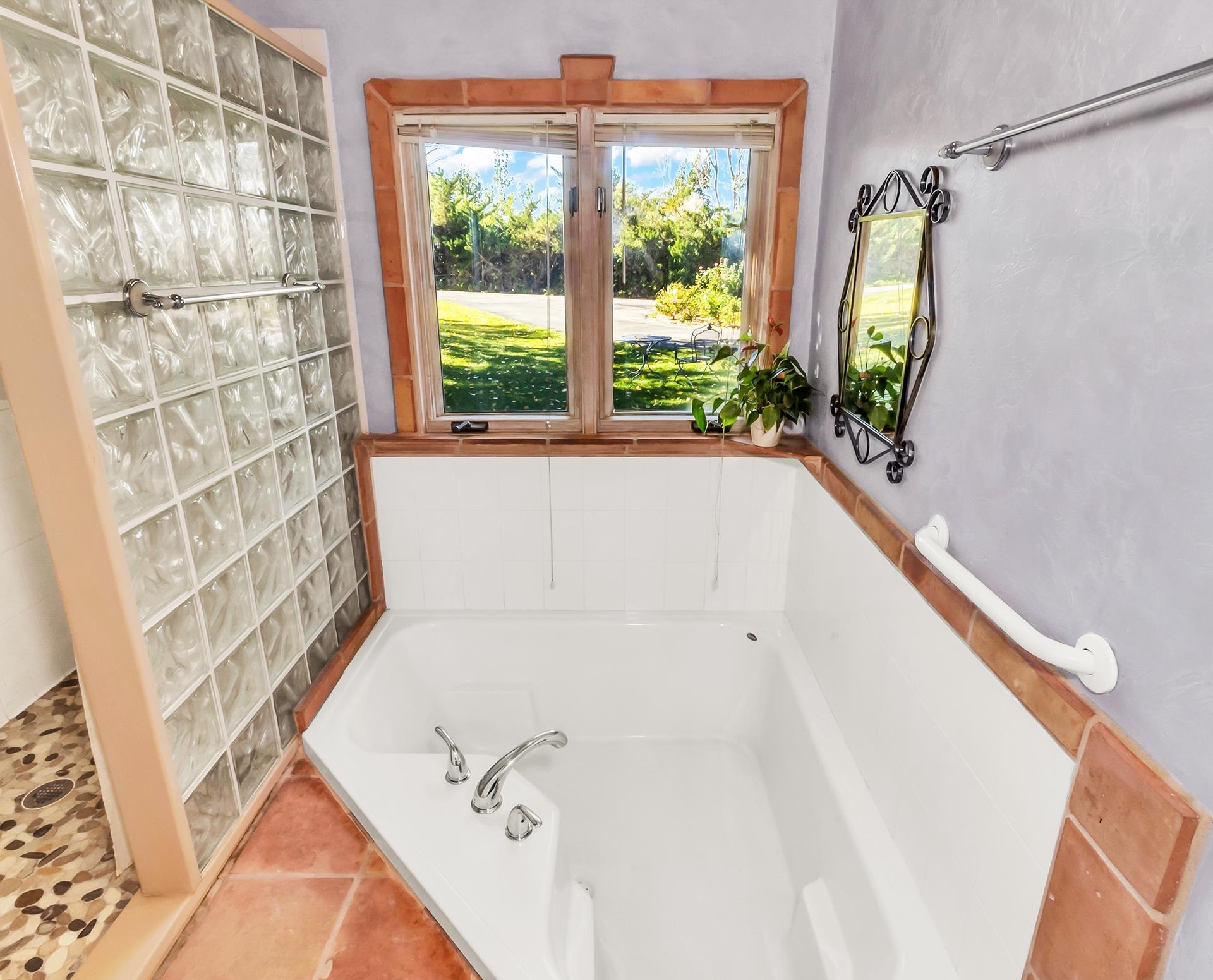 3310 C Road Palisade, CO 81526 - Photo 30 of 41 a bathroom with a bathtub and shower