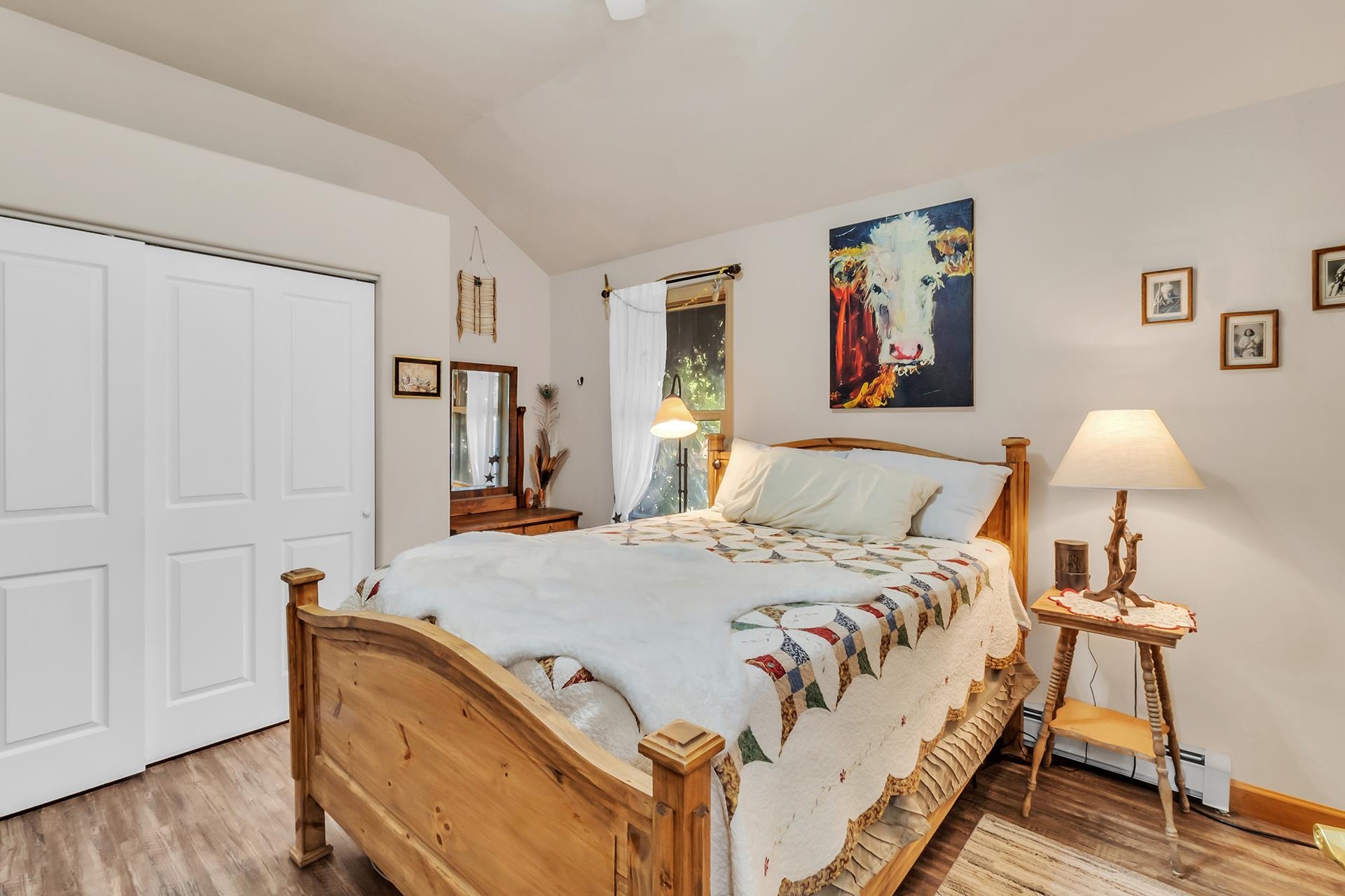 3310 C Road Palisade, CO 81526 - Photo 34 of 41 a bedroom with a bed and a lamp