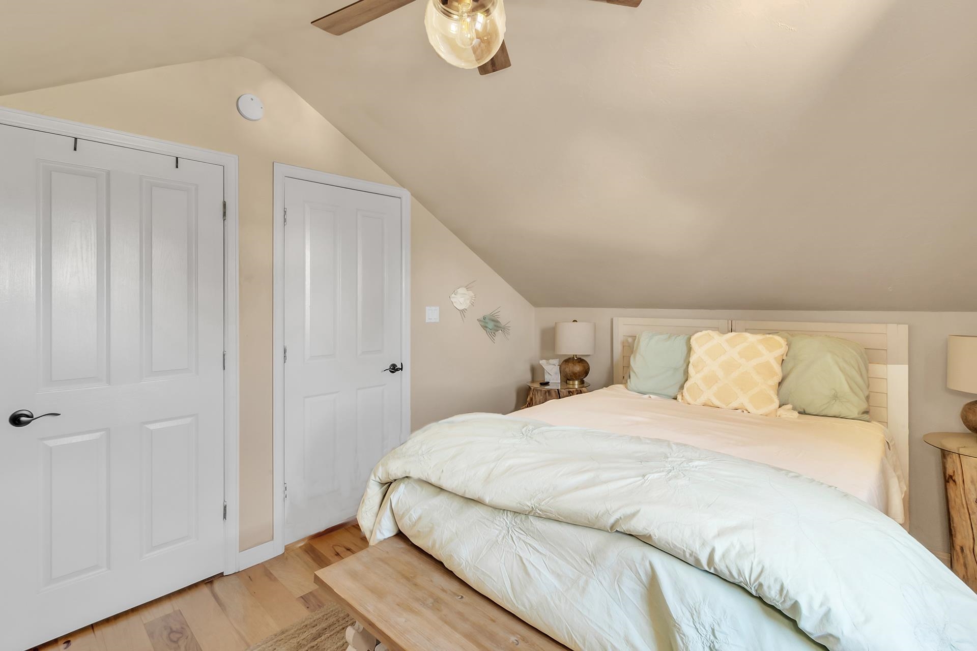 3310 C Road Palisade, CO 81526 - Photo 38 of 41 a bedroom with a bed and cabinets