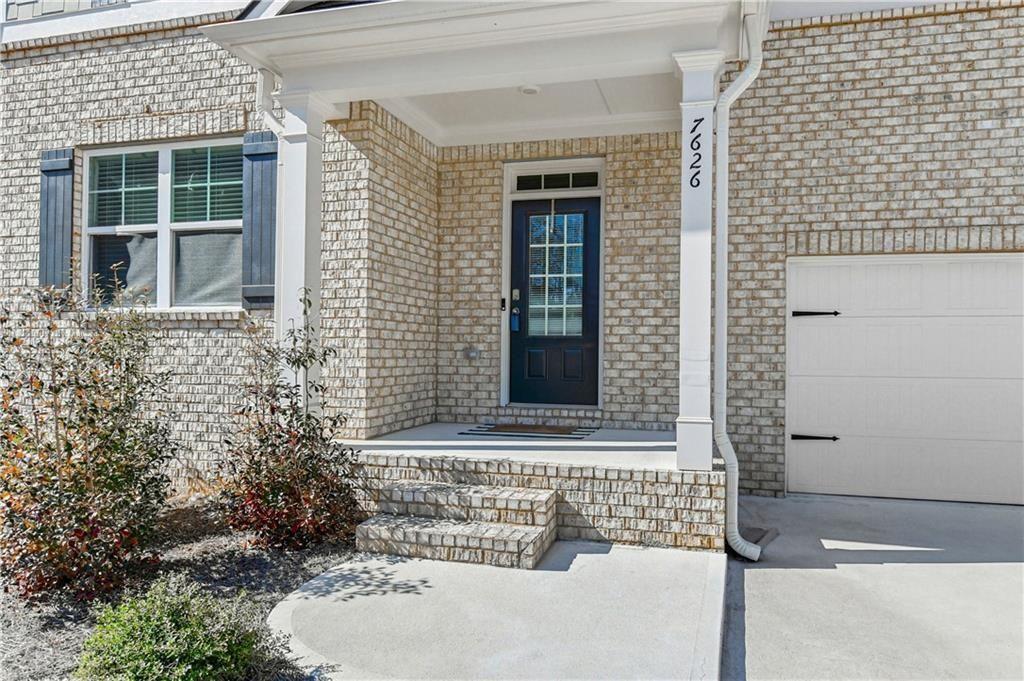 7626 Jennadee Drive Fairburn, GA 30213 - Photo 2 of 27 a front view of a house with a yard
