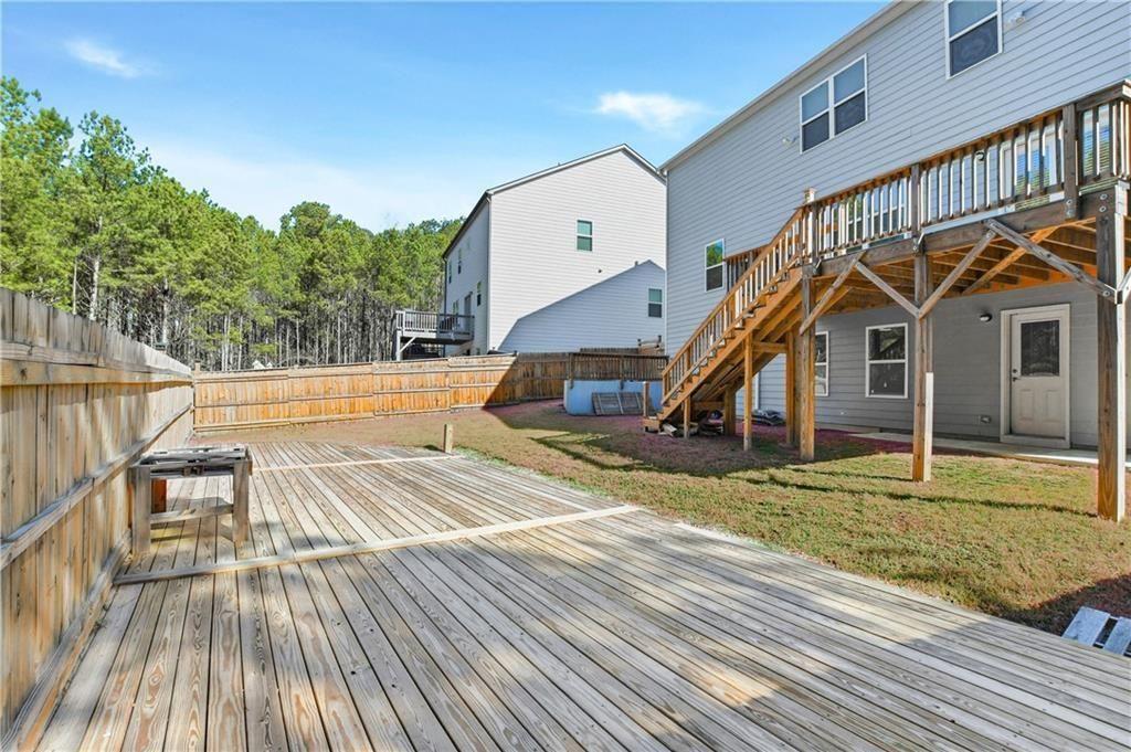 7626 Jennadee Drive Fairburn, GA 30213 - Photo 26 of 27 a view of outdoor space deck and lake view
