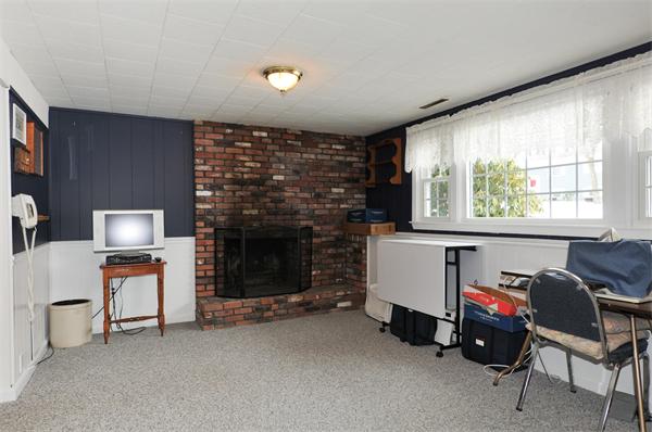 15 Fencourt Road Canton, MA 02021 - Photo 15 of 15 a living room with furniture and a fireplace