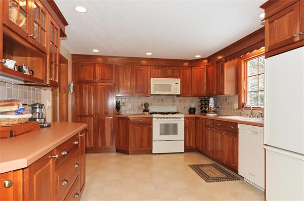 15 Fencourt Road Canton, MA 02021 - Photo 2 of 15 a kitchen with stainless steel appliances granite countertop a stove sink and cabinets