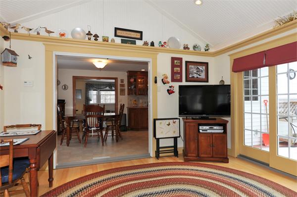 15 Fencourt Road Canton, MA 02021 - Photo 5 of 15 a view of a livingroom with furniture and a flat screen tv