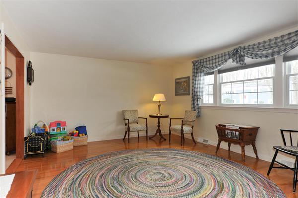 15 Fencourt Road Canton, MA 02021 - Photo 7 of 15 a living room with furniture a rug and a table