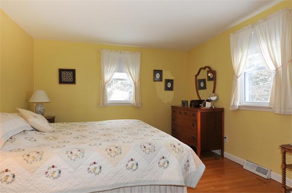15 Fencourt Road Canton, MA 02021 - Photo 9 of 15 a bedroom with a bed and a dresser in it