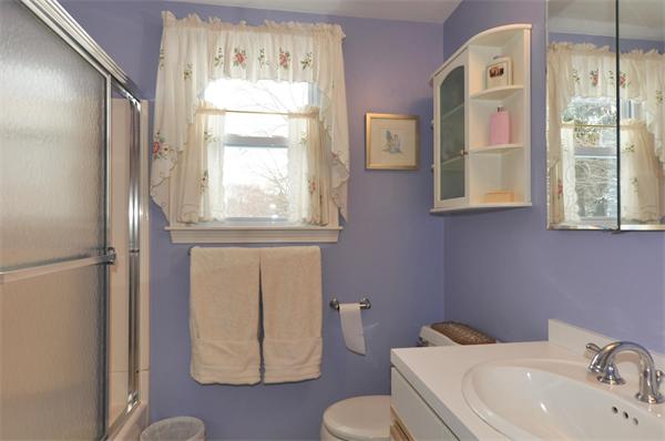 15 Fencourt Road Canton, MA 02021 - Photo 10 of 15 a bathroom with a sink and a mirror