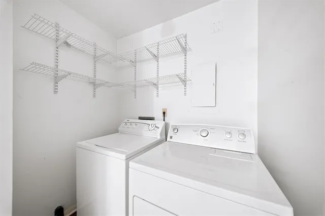 a utility room with dryer and washer