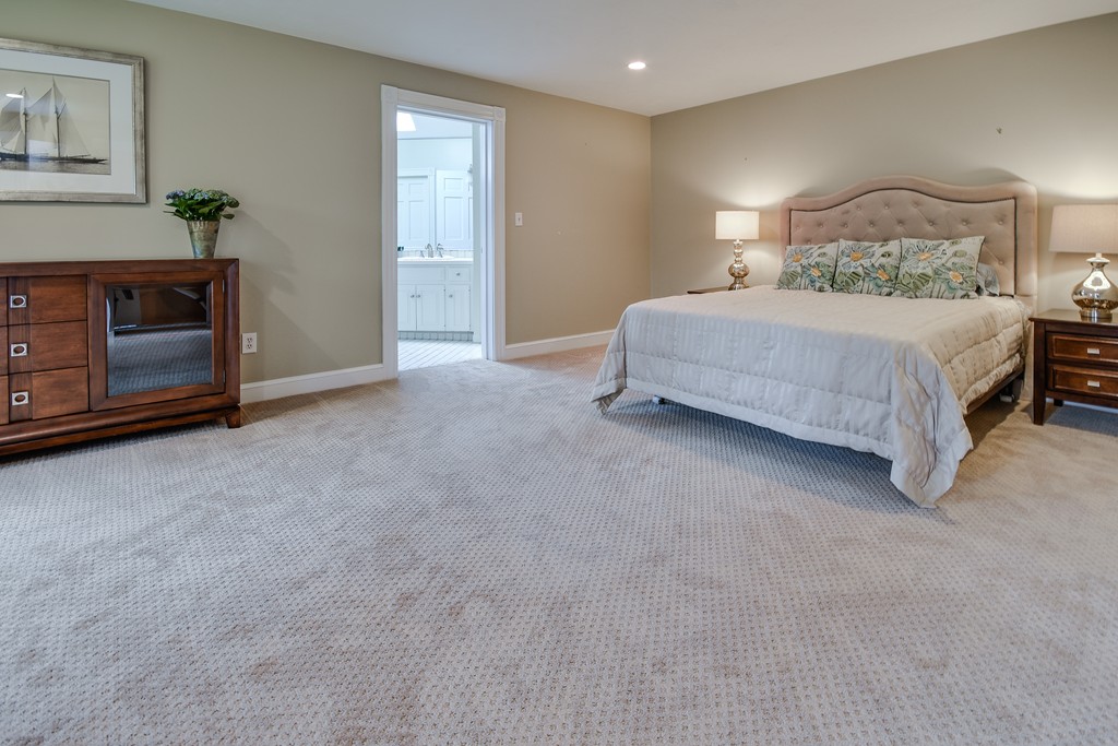 929 Salem End Road Framingham, MA 01702 - Photo 19 of 29 a bedroom with a bed and a night stand