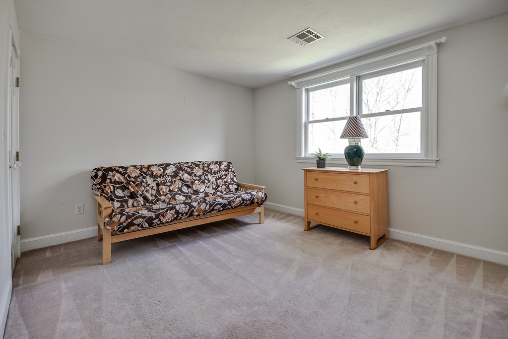 929 Salem End Road Framingham, MA 01702 - Photo 25 of 29 a bed room with a bed and a window