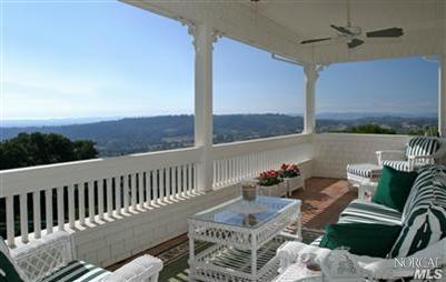 1820 Calistoga Road Santa Rosa, CA 95404 - Photo 2 of 12 a roof deck with couches and wooden floor